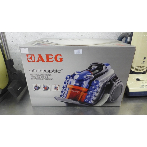 5134 - An AEG Ultra Captic compact vacuum cleaner with Aero-Pro silent nozzle and Hepa 13 filtration system... 