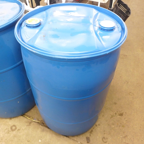 5193 - A pair of blue plastic barrels