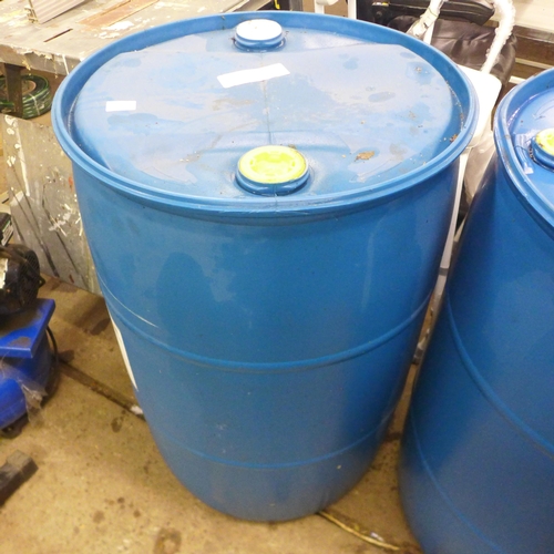 5193 - A pair of blue plastic barrels