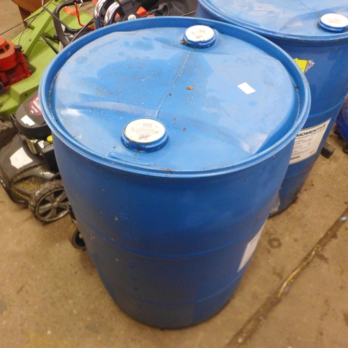 5194 - A pair of blue plastic barrels