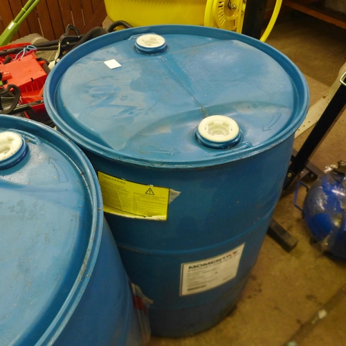 5194 - A pair of blue plastic barrels