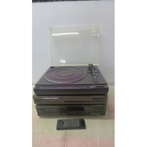 5122 - A quantity of stereo equipment including a Trio KD-34R Automatic return turntable, a Technics ST-610... 