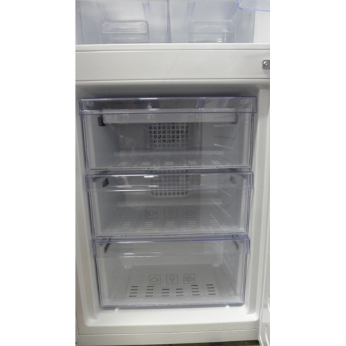 5127 - A Beko 60/40 CXFG1552W free standing tower fridge freezer