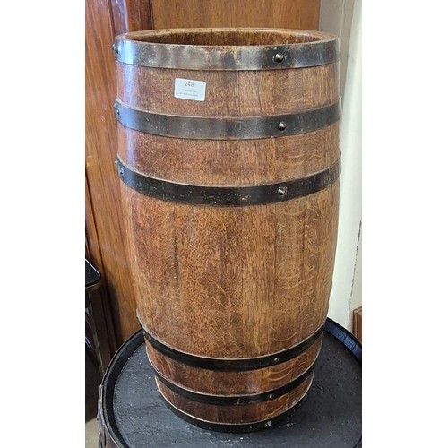 323 - A coopered oak barrel shaped stick stand