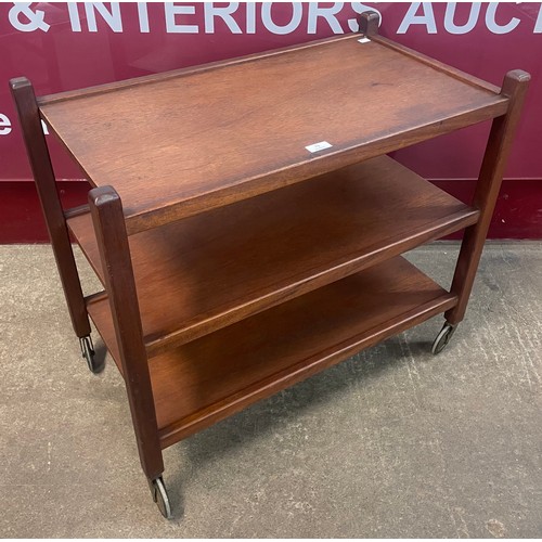 73 - A teak three tier cocktail trolley