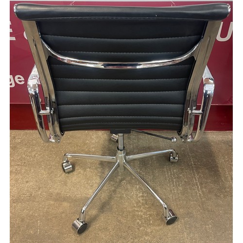 80 - An Eames style black leather and chrome revolving desk chair