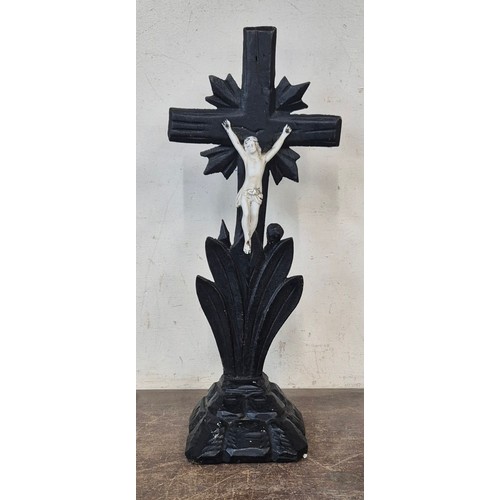 363 - A French ebonised and faux ivory crucifix