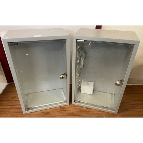 304 - Two metal display cabinets
