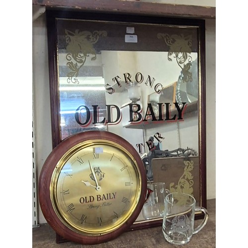 366 - A Mansfield Brewery commemorative glass tankard, an Old Bailey clock and mirror