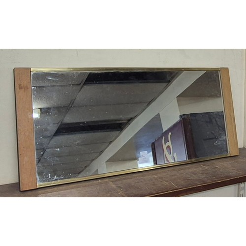 377 - A teak framed mirror