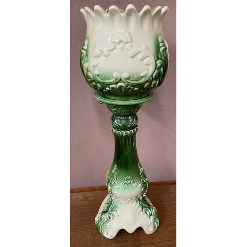 313 - An Art Nouveau style porcelain jardiniere and stand
