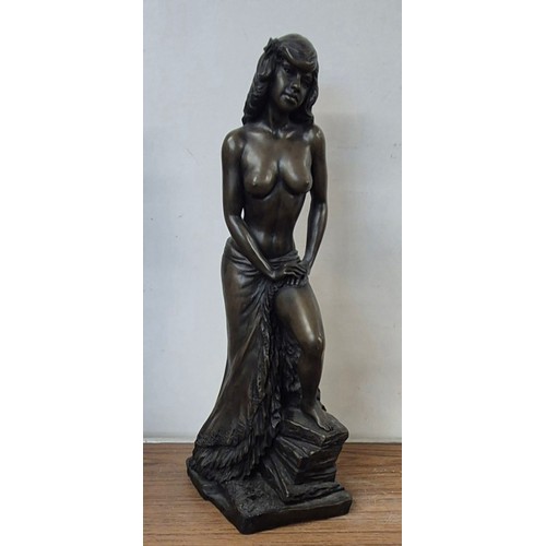 391 - A bronze effect figure of a female nude, based signed John Letts