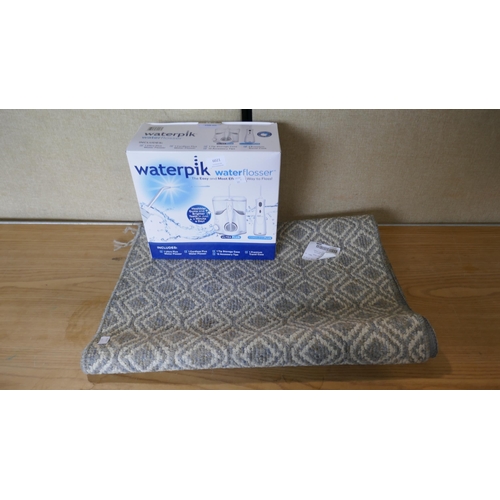 6021 - Waterpik Water Flosser -  Wp150/Wp470Uk, Multy Floor Runner 24X72 (335-220,245) *This lot is subject... 