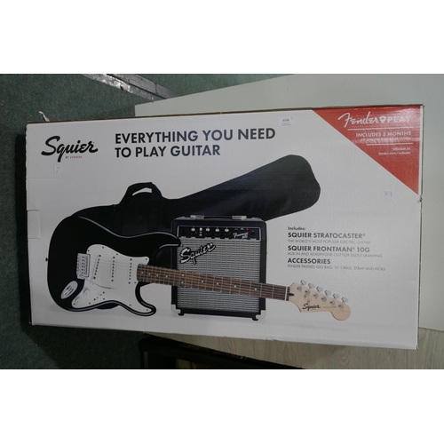 6198 - Squier Electric Guitar+Amp - This lot requires a UK adapter (334-449) *This lot is subject to Vat