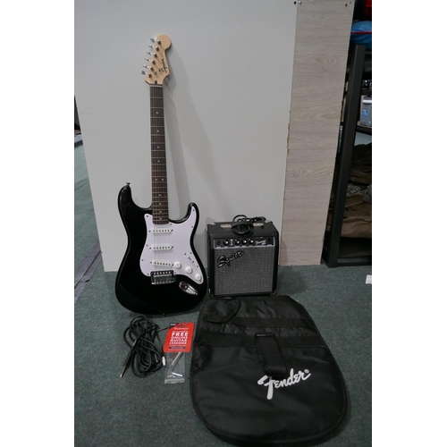 6198 - Squier Electric Guitar+Amp - This lot requires a UK adapter (334-449) *This lot is subject to Vat