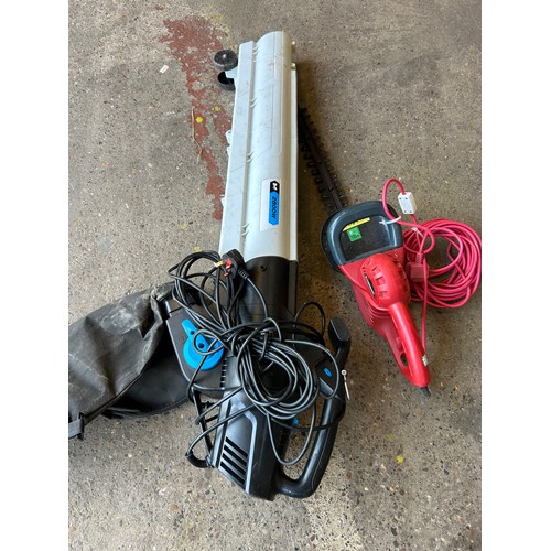 5153 - Two electric garden tools - Macallister 2800w electric blower with a Sovereign HTG32-550 hedge cutte... 