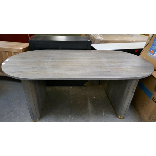 3099 - A grey washed hardwood oval dining table  * This lot is subject to VAT