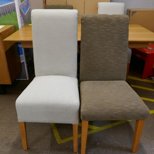 3141 - A set of four upholstered dining chairs, two mint green, two brown, contrasting design