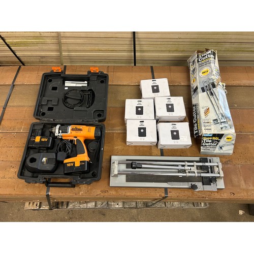 5022 - 5 x 12V tyre inflators, all boxed and a Plasplugs wall and floor heavy duty tile cutter and Triton 1... 