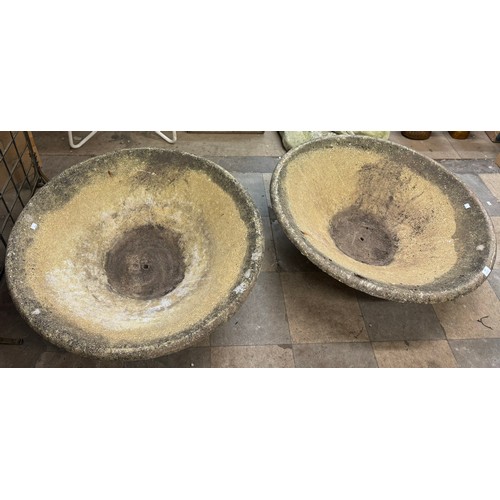 403 - A pair of large conical concrete planters