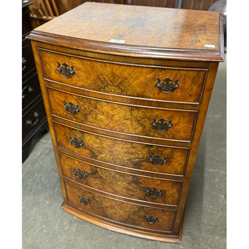 404 - A small George III style figured walnut bow front chest of drawers