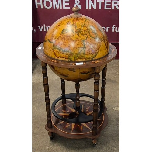 10 - An Italian terrestrial globe cocktail cabinet/trolley