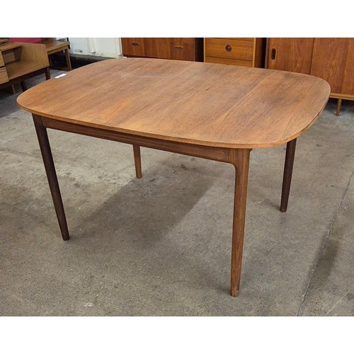 14 - A G-Plan Danish Design teak extending dining table, designed by Ib Kofod Larsen