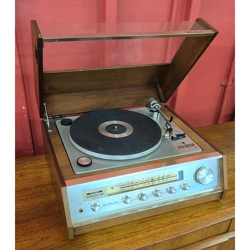 11 - A Sharp 6S-5500 teak record player and a pair of matching Sharp speakers