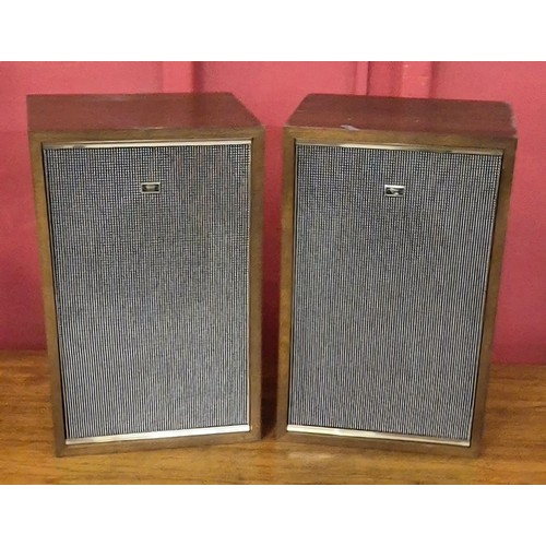 11 - A Sharp 6S-5500 teak record player and a pair of matching Sharp speakers