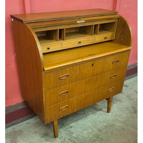 17 - A Swedish S.M.I. teak cylinder bureau, designed by Egon Ostergaard