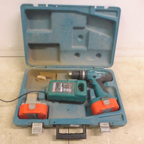 5007 - A Makita 8391D cordless drill with spare battery (P18 18V 1.3A H)