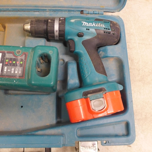 5007 - A Makita 8391D cordless drill with spare battery (P18 18V 1.3A H)