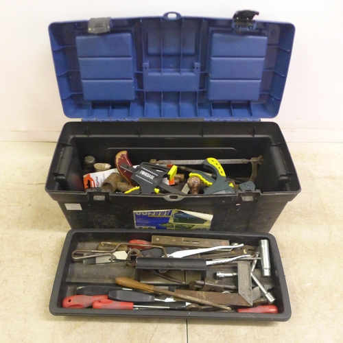 5016 - A plastic 60cm toolbox with a quantity of tools including hammers, clamps, spanners, saws, chisels, ... 