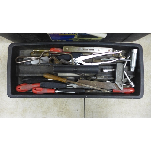 5016 - A plastic 60cm toolbox with a quantity of tools including hammers, clamps, spanners, saws, chisels, ... 