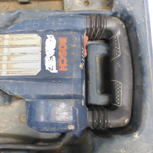 5028 - A Bosch 240V concrete breaker - with case and a radio detection cable avoidance tool