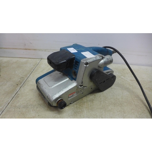 5043 - A Makita LS1040 240v chop saw and a Makita 9404 belt sander