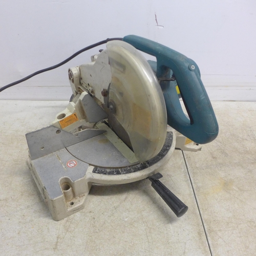 5043 - A Makita LS1040 240v chop saw and a Makita 9404 belt sander