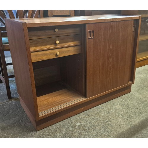 23 - A Danish teak fitted two door cabinet