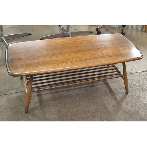 24 - An Ercol Golden Dawn ash Windsor coffee table