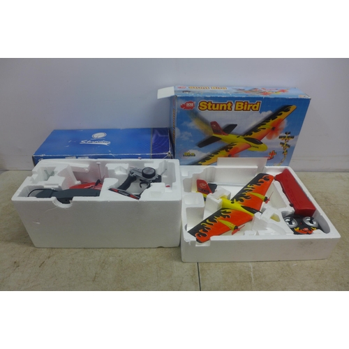 5058 - A Skycopter RC radio controlled helicopter and a Dickies Stunt Bird radio controlled plane