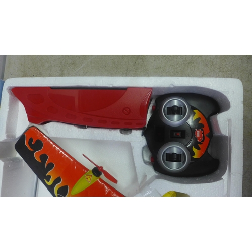 5058 - A Skycopter RC radio controlled helicopter and a Dickies Stunt Bird radio controlled plane