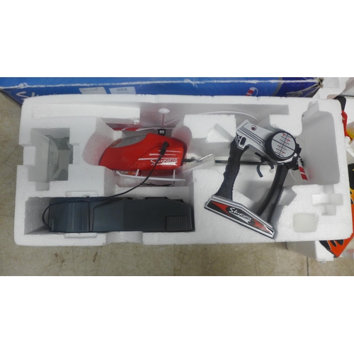 5058 - A Skycopter RC radio controlled helicopter and a Dickies Stunt Bird radio controlled plane