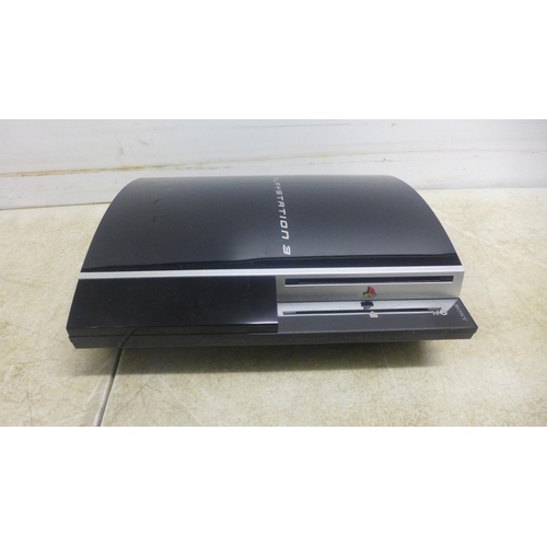 5061 - A Playstation 3 games console and a quantity of games including Tiger Woods PGA Tour 11, 13 and 14, ... 