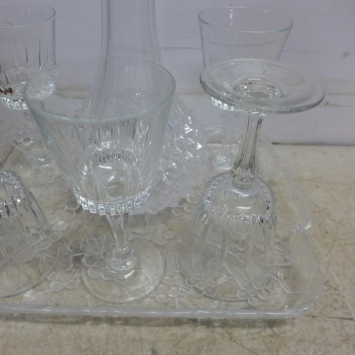 5060 - Six various black shirts, a hat and a glass decanter and wine glass set