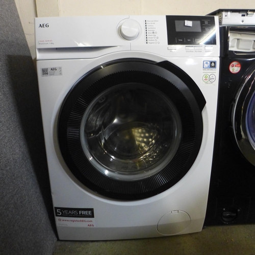 4001 - AEG ProSteam Free Standing Washing Machine. Crack on top back right,Model No LFR71844B Original RRP ... 