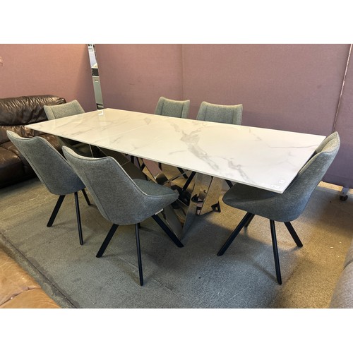 3034 - Marvel extending dining table and six chairs *This lot is subject to VAT