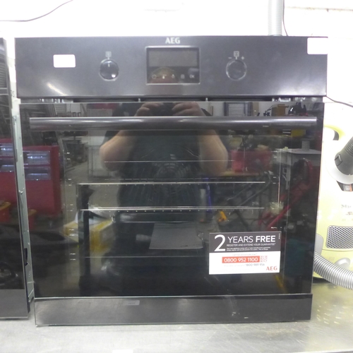 5274 - An AEG multi function model BEB335061B integrated oven