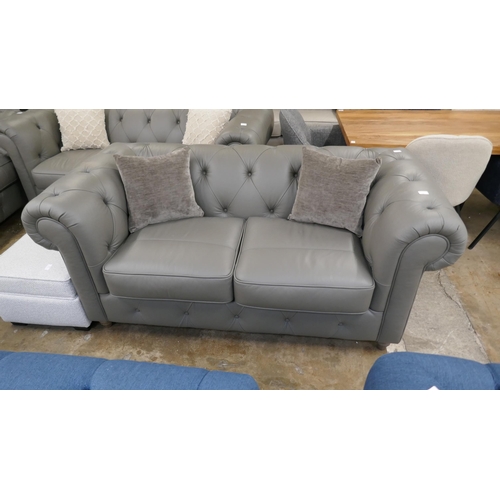 3061 - A grey leather Chesterfield 2.5 seater sofa