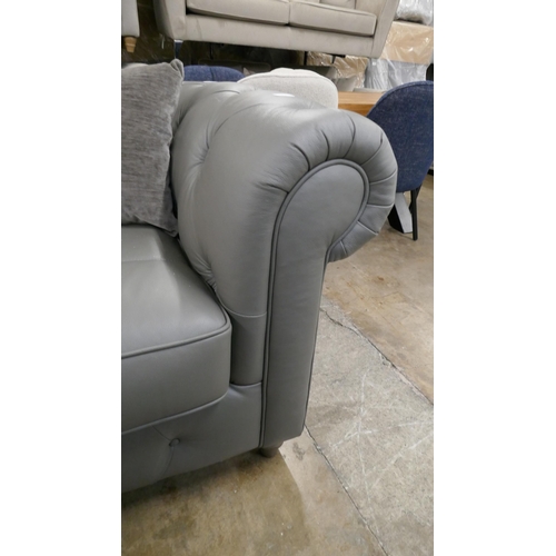 3061 - A grey leather Chesterfield 2.5 seater sofa