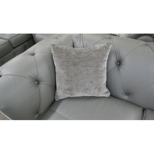 3061 - A grey leather Chesterfield 2.5 seater sofa